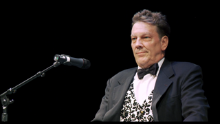 a picture of Tony Millionaire in a Tuxedo